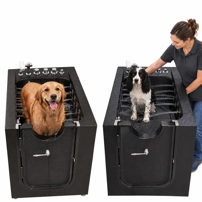 Two black walk-in pet tubs, one with a golden retriever and one with a small spaniel on the platform