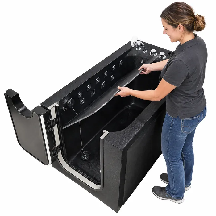 Woman lifting the removable platform out of the black walk-in pet tub